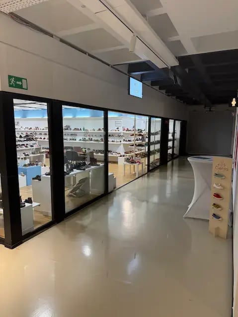 Hallway view leading to the Moda Vostra showroom at Trademart Brussels.