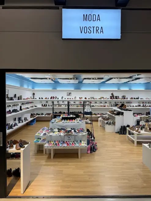 Side entrance of the Moda Vostra showroom at Trademart Brussels.